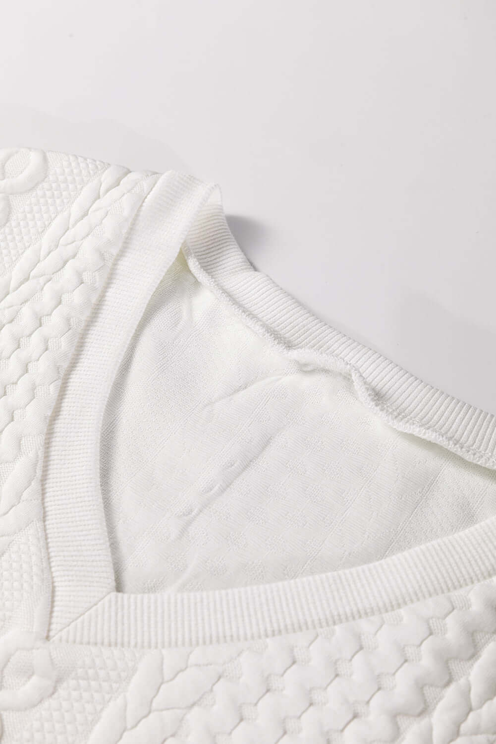 White Solid Color Textured V Neck Drop Shoulder Knit Top
